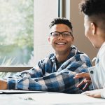 boys talking in class